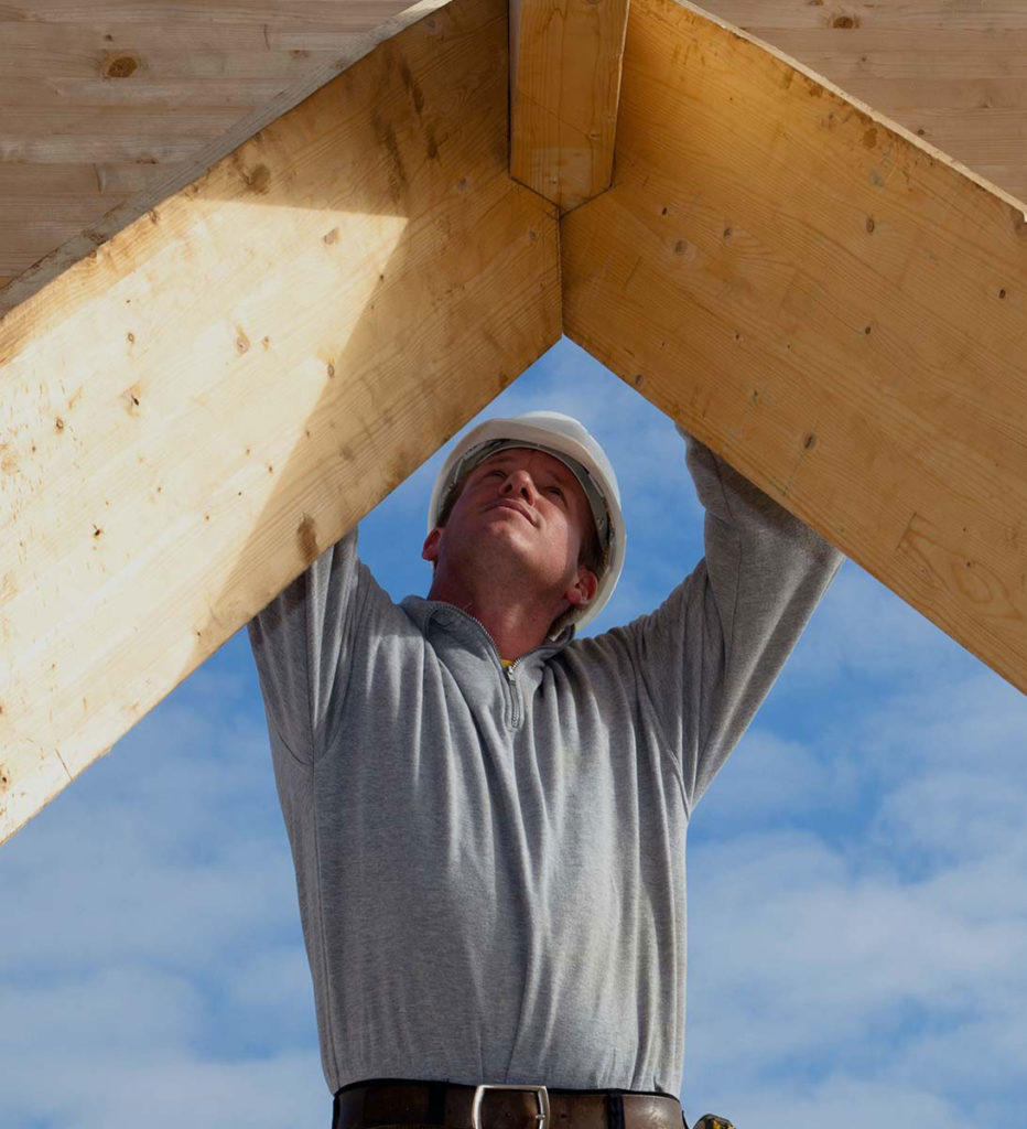 Man Building a Roof